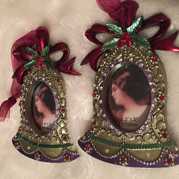 Two bell shape metal and enamel ornaments with picture frame and ribbon